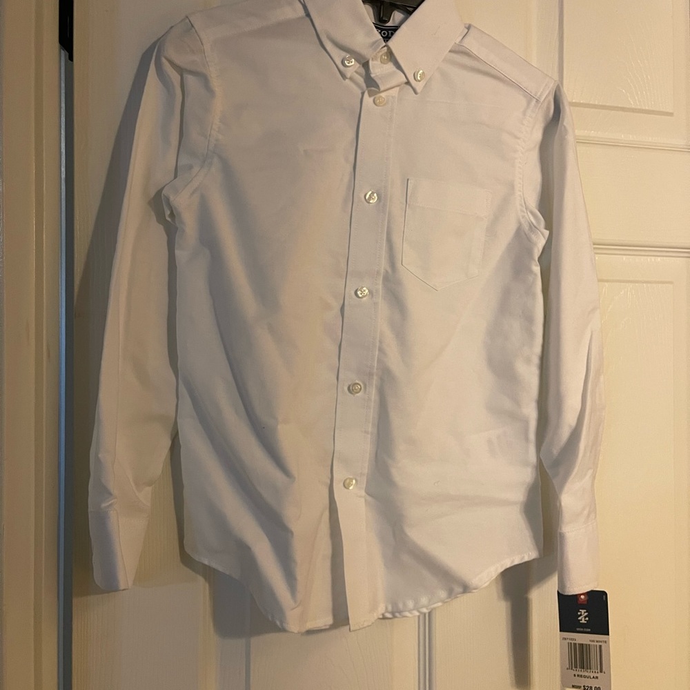 New with tags, white Oxford style long sleeve button up. Boys size 8